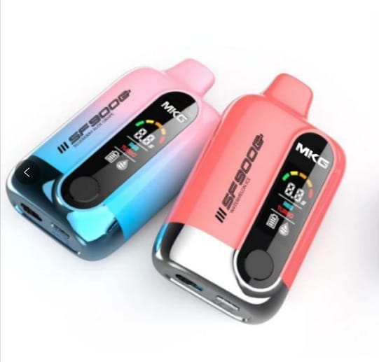 Close-up of an advanced vape device with a bright digital user interface showing settings like wattage, temperature, and puff count.