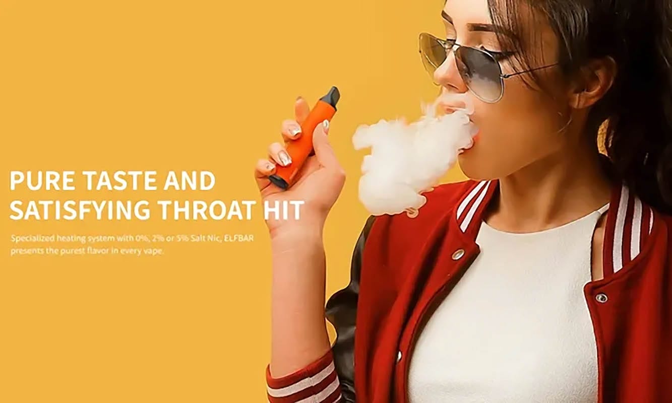 A person exhaling vapor from a vape device, with a serene expression, illustrating the enjoyment of a predictable and satisfying sensory experience like consistent flavor and smooth draw.