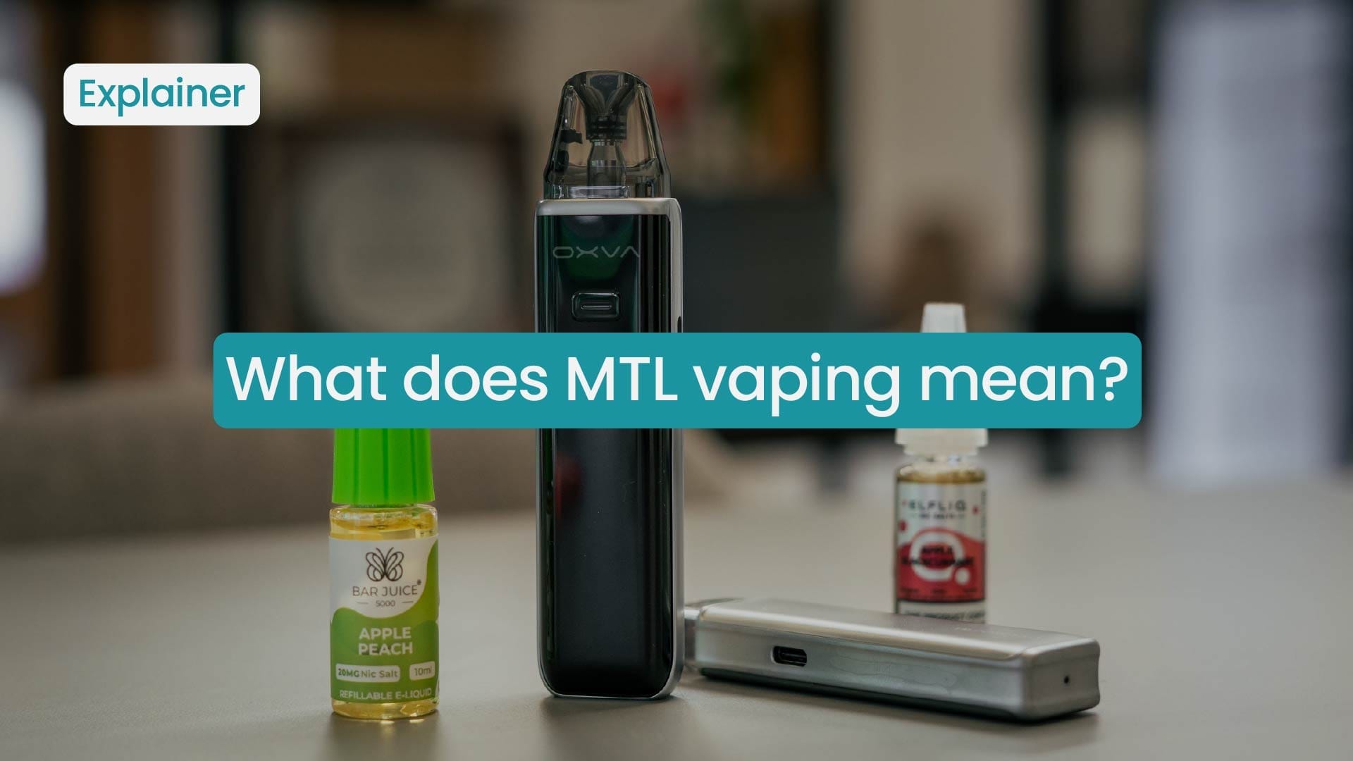 Close-up image of a compact, pen-style or pod vape device, typically used for Mouth-to-Lung (MTL) vaping, highlighting its narrow airflow intake port.