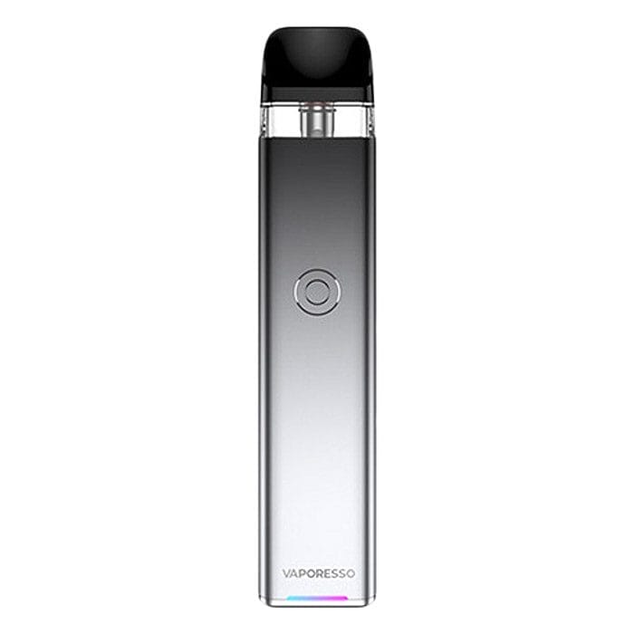 A closed pod vape device with its proprietary replacement pods laid out next to it, illustrating the