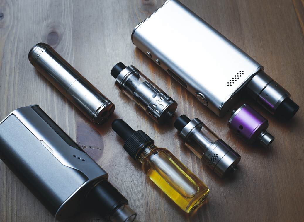 A close-up shot of an adjustable vape mods screen displaying a wattage setting that exceeds the coils recommended range, potentially with a warning icon.
