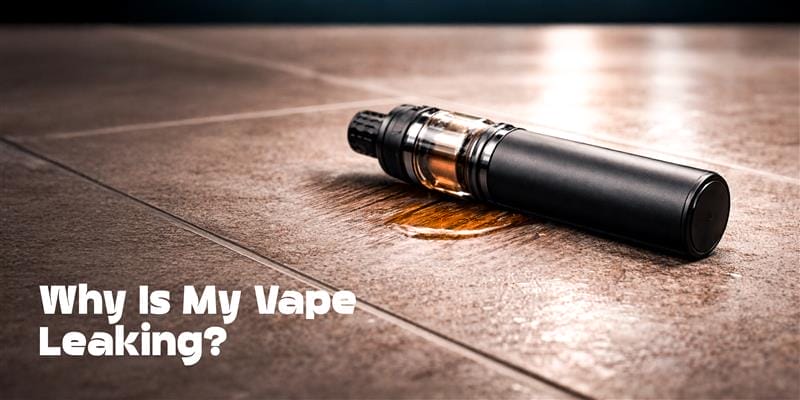 A vape device lying flat on its side on a surface, illustrating incorrect horizontal storage that can lead to e-liquid leaks.